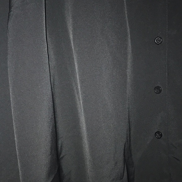 A black button down blouse. - Picture 3 of 6